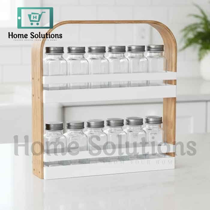 Wooden spice rack with glass jars on a white background