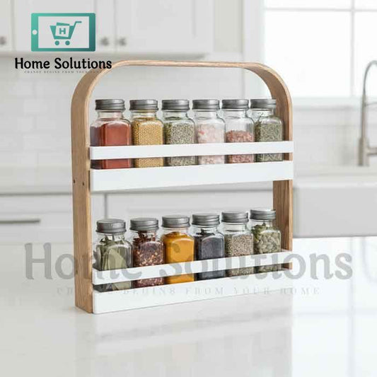 Spice rack with labeled jars on a kitchen counter