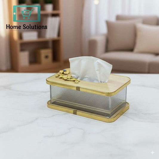 Decorative tissue box on a table with a blurred background of a living room.