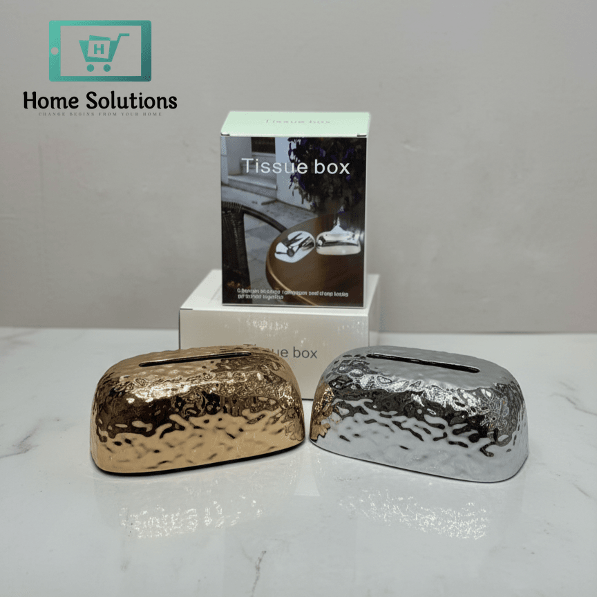 Two metallic tissue boxes with a box labeled 'Tissue box' in the background.