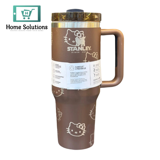 Brown travel mug with Hello Kitty designs and Stanley branding on a white background.