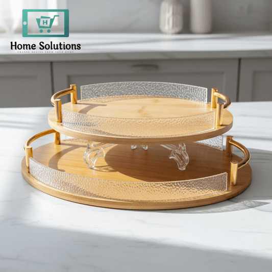Two-tiered decorative tray with gold rim on a marble surface