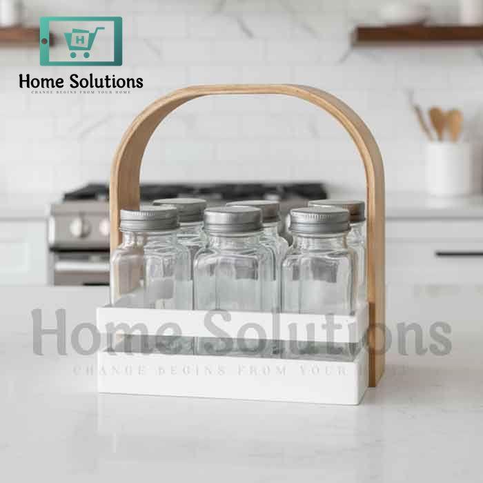6 clear glass spice jars with silver lids in a white plastic base with a natural wood handle – kitchen spice organizer set for Pakistani homes