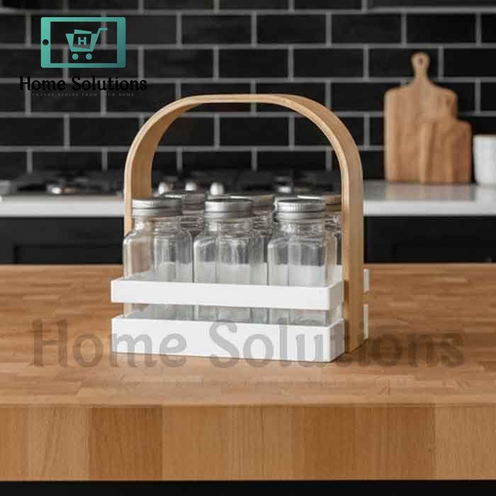 6 clear glass spice jars with silver lids in a white plastic base with a natural wood handle – kitchen spice organizer set for Pakistani homes