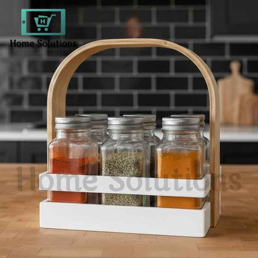6 clear glass spice jars with silver lids in a white plastic base with a natural wood handle – kitchen spice organizer set for Pakistani homes
