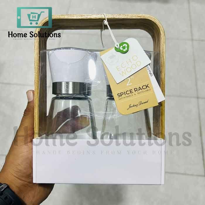 Elegant salt and pepper grinder set with white tops and wooden handle, perfect for modern Pakistani kitchens and cooking essentials