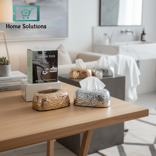 Modern living room with a coffee table, decorative items, and a blurred background.