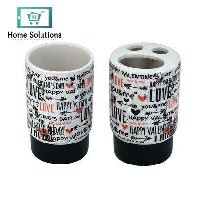 Two ceramic containers with Valentine's Day-themed designs on a white background, branded 'Home Solutions'.