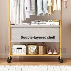Multifunctional Bamboo Clothes Hanger Stand with Double Layered Fabric Basket 4 - Home Solutions