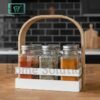 6 clear glass spice jars with silver lids in a white plastic base with a natural wood handle – kitchen spice organizer set for Pakistani homes
