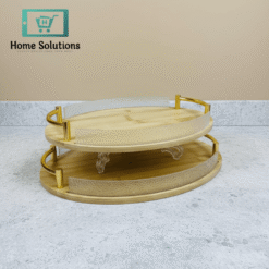 Two wooden tray with gold accents on a light gray surface.