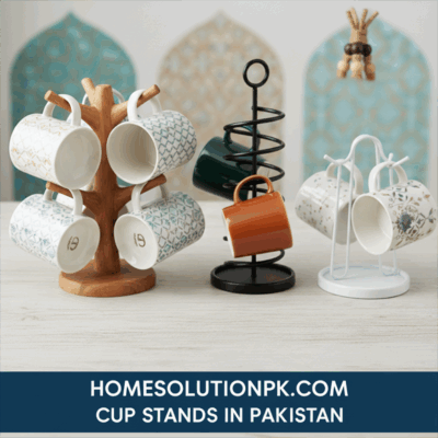 Assortment of stylish cup stands (mug racks) in wood, black metal, and white metal, holding various decorative mugs. Ideal kitchen organization solutions from Homesolutionspk.com's 'Cup Stands in Pakistan' category.