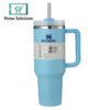 Blue Stanley mug with handle and straw