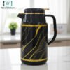 Black and gold 1 litre insulated vacuum flask jug on kitchen countertop