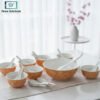 Elegant 14-Piece Marbled Ceramic Soup Bowl Set - Orange 1 14-piece marbled ceramic soup bowl set with golden rim bowls and spoons