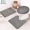 3-piece bathroom mat set with a soft bath mat, contour rug, and toilet lid cover in matching design, non-slip and absorbent for everyday bathroom use.