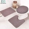 3-piece bathroom mat set with a soft bath mat, contour rug, and toilet lid cover in matching design, non-slip and absorbent for everyday bathroom use.