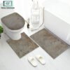 3-piece bathroom mat set with a soft bath mat, contour rug, and toilet lid cover in matching design, non-slip and absorbent for everyday bathroom use.
