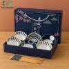Elegant Japanese ceramic bowls set with golden ribbon bag