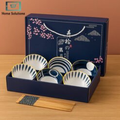 Elegant Japanese ceramic bowls set with golden ribbon bag
