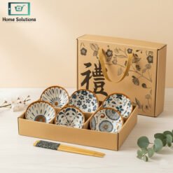 Elegant Japanese ceramic bowls set with golden ribbon bag