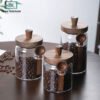 Wooden knob glass jar with spoon