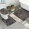 3-piece bathroom mat set with a soft bath mat, contour rug, and toilet lid cover in matching design, non-slip and absorbent for everyday bathroom use.
