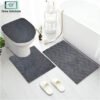 3-piece bathroom mat set with a soft bath mat, contour rug, and toilet lid cover in matching design, non-slip and absorbent for everyday bathroom use.
