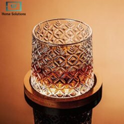 Spinning whiskey glass set with wooden coasters. Extra-large crystal glasse set with smooth rotating base — perfect for bourbon, scotch & gifting.