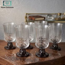 ribbed glass set with black pedestal base