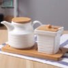 ceramic sugar and creamer set with wooden tray