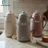 Elegant 1L vacuum flask thermal insulated jug with ergonomic handle spill proof spout for hot and cold tea coffee serving
