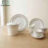 Elegant Porcelain Tea Set 24 Pieces 1 Elegant porcelain tea set with silver rim