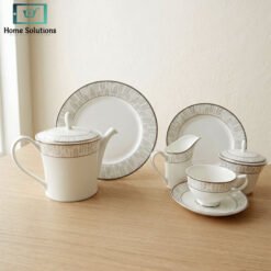 Elegant porcelain tea set with silver rim