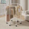 Hexagonal Rotating Clothes Rack with Wheels | Metal Movable Clothing Storage Stand 1 Hexagonal rotating clothes rack with wheels