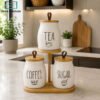 Premium 3-Piece Ceramic Jar Set with Wooden Stand - Tea, Coffee & Sugar 2 Premium 3-Piece Ceramic Tea Coffee Sugar Jar Set with Wooden Lids and Wooden Stand for Kitchen Countertop Storage