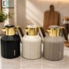 Feenik Vacuum Thermos Flask 1.0Ltr 2 Luxurya 1.0L Vacuum Thermos Flask with Matte Black and Ivory White Finish, Gold Handle and Decorative Gold Panel
