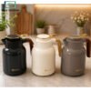 Feenik Vacuum Thermos Flask 1.5Ltr 2 Luxurya 1.0L Vacuum Thermos Flask with Matte Black and Ivory White Finish, Gold Handle and Decorative Gold Panel