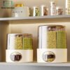 Rotating Multi-Grain Storage Dispenser 1 Rotating multi-grain storage dispenser with airtight compartments