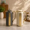 Luxury Vacuum Thermos Flask 1.0L with Gold Handle 2 Luxury 1.0L Vacuum Thermos Flask with Matte Black and Ivory White Finish, Gold Handle and Decorative Gold Panel
