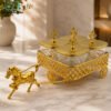 Luxury Candy Glass Jar Set 4 Pcs with Gold Horse Carriage Stand 1 Luxury 4-piece clear Candy Glass Jar Set with decorative gold lids and elegant horse carriage metal stand for serving dry fruits, chocolates, candies and snacks.